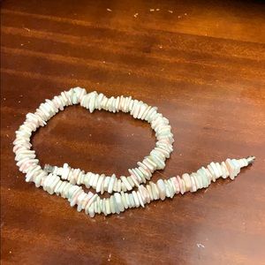 Multi-colored puka shell necklace